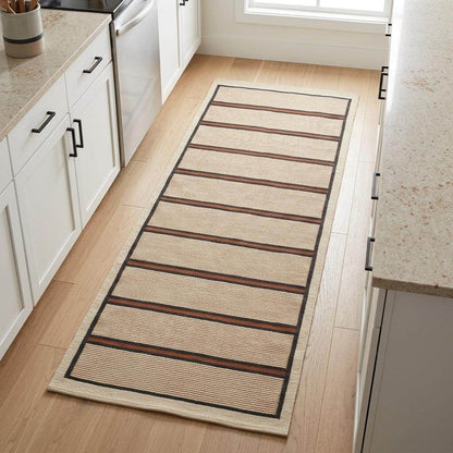 Wool flatweave runner rug with ivory, navy, and rust stripes in kitchen hallway setting