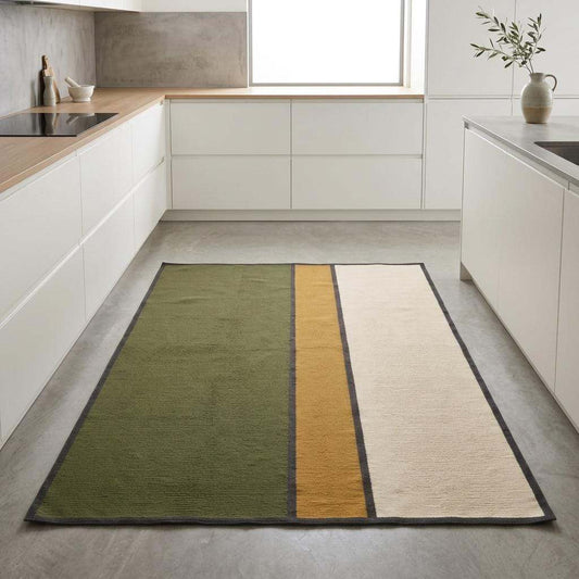 Olive green wool flatweave area rug with mustard and ivory color blocks and charcoal border
