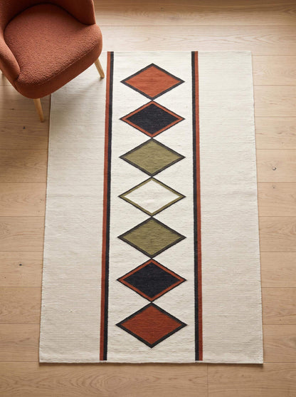 Ivory rust diamond kilim rug handwoven wool flatweave Southwestern design on natural ivory background