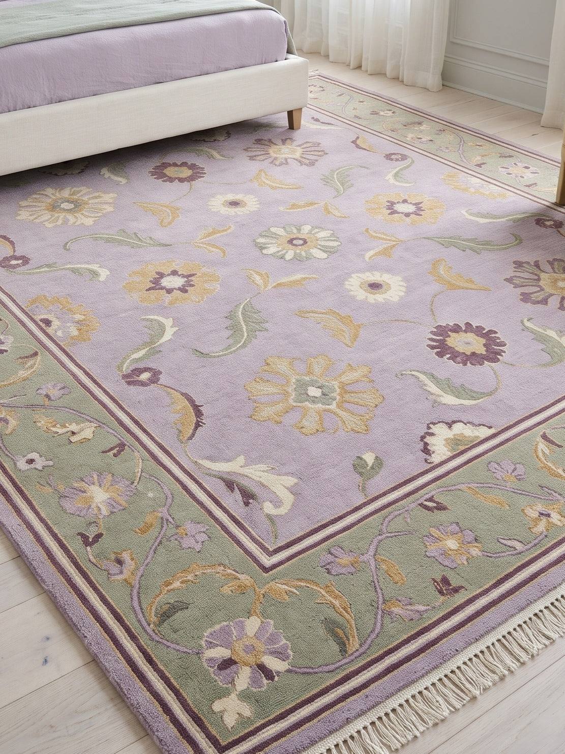 Lavender Floral Rug in hand-knotted wool, with a pale lilac field, colorful blooms, sage vine border and fringe