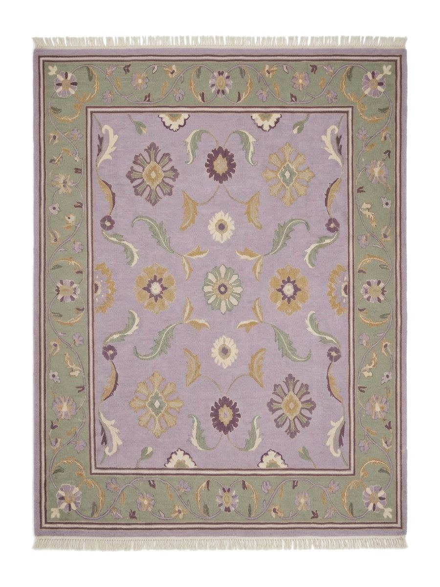 Lavender Floral Rug with a pale lilac field, multicoloured floral motifs, sage green vine border and fringe