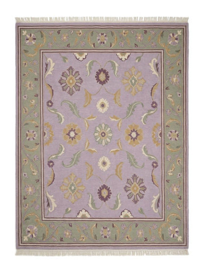 Lavender Floral Rug with a pale lilac field, multicoloured floral motifs, sage green vine border and fringe