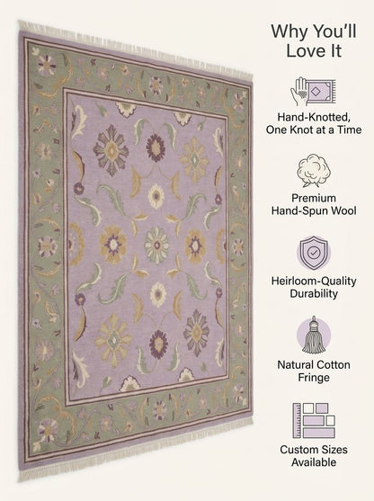 Lavender Floral Rug in hand-knotted wool, with a lilac field, sage green floral vine border, ivory fringe and pastel blooms