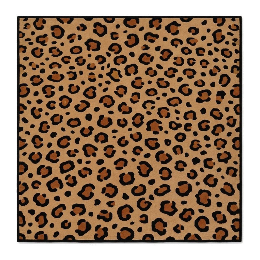 Leopard Print Rug in tan with irregular black rosettes and a narrow solid black border