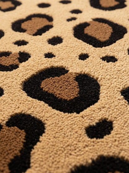 Leopard Print Runner Rug in plush tan wool with raised black rosettes, brown centres and scattered spots