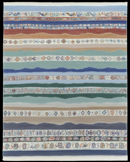 Multicolor striped area rug with horizontal bands, diamond motifs, and fringe in coastal blues and earthy terracotta tones