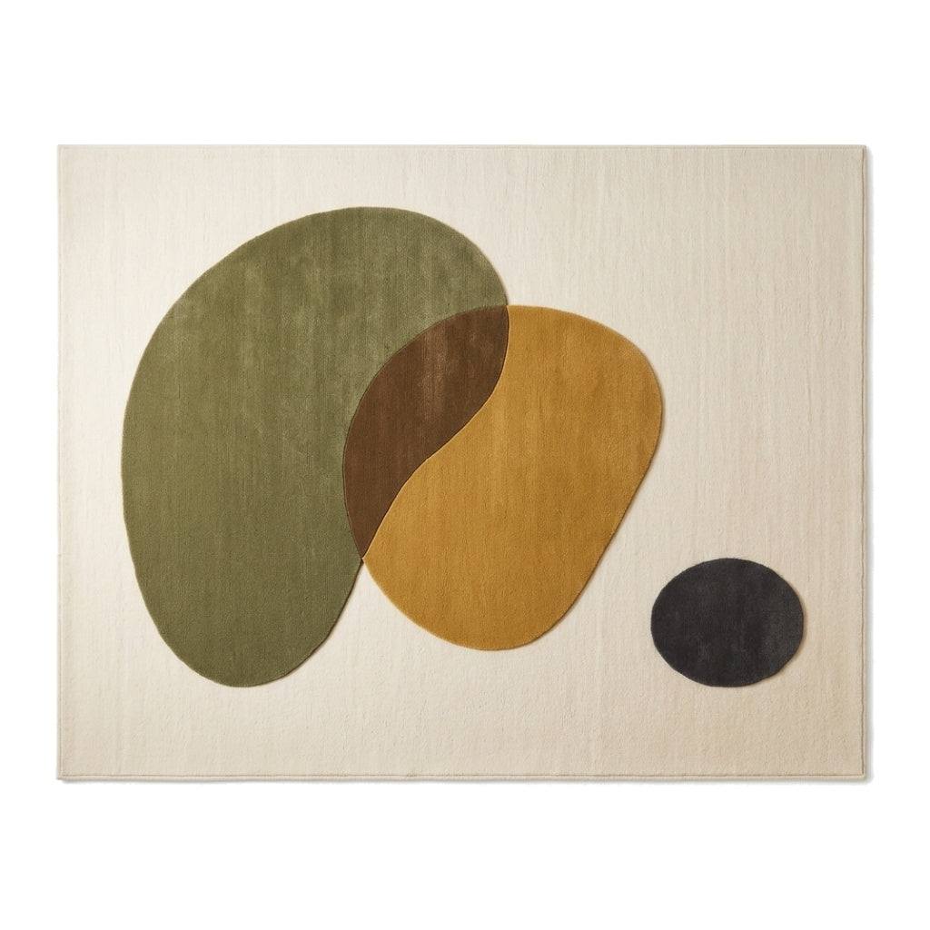 Organic Abstract Rug with an ivory wool base and overlapping olive, mustard, brown and charcoal pebble shapes