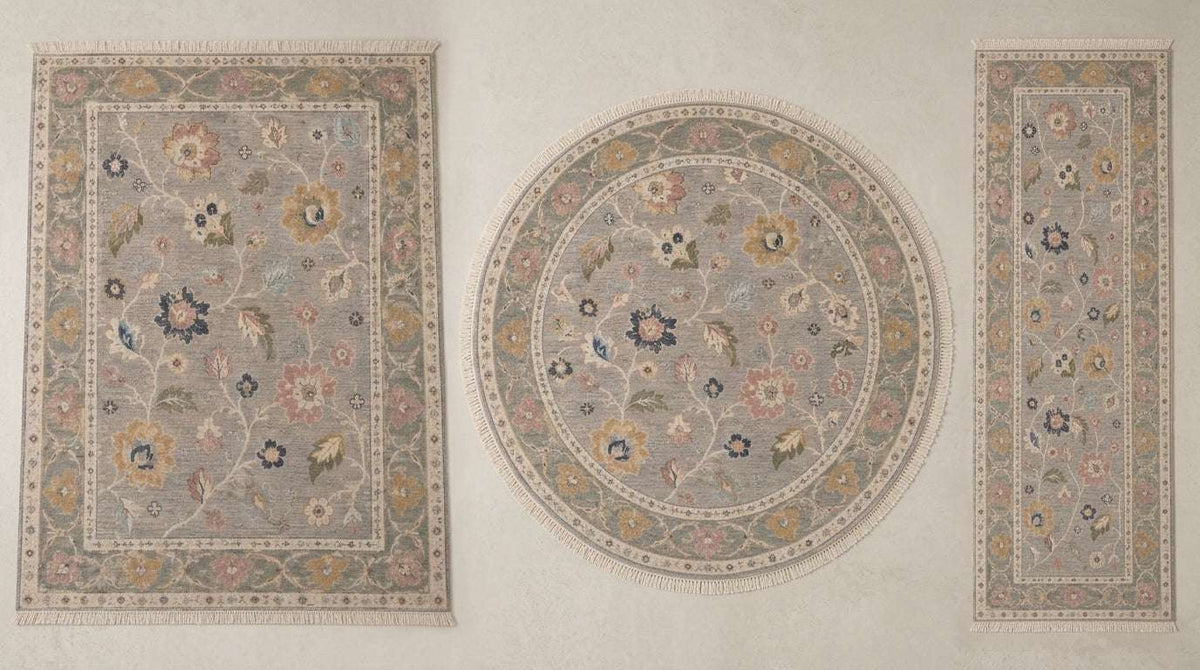 Oushak Hand Knotted Rug in dove gray with muted floral motifs, shown in rectangular, round and runner shapes with sage-toned borders.