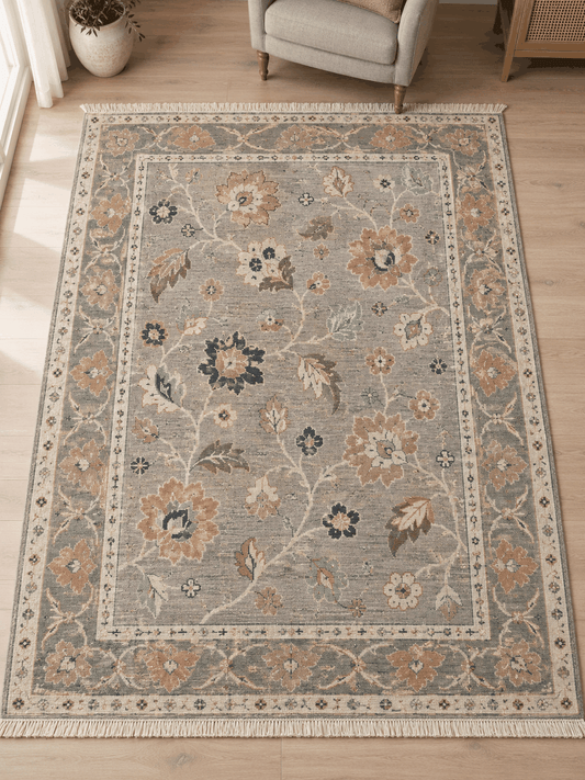 Oushak Hand Knotted Rug in dove gray wool with blush, ochre and navy floral motifs, ivory vines and sage-toned border