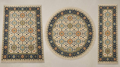 Oushak Hand Knotted Rug in ivory wool with navy-outlined hexagon medallions, aqua, rust and olive details and navy borders