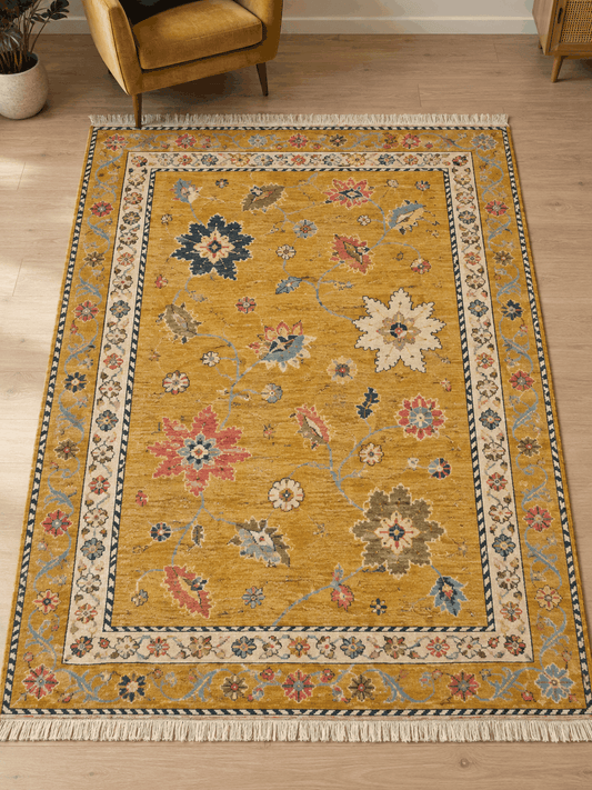 Oushak Hand Knotted Rug in mustard yellow wool, with multicolour floral motifs, an ivory rosette border and fringe