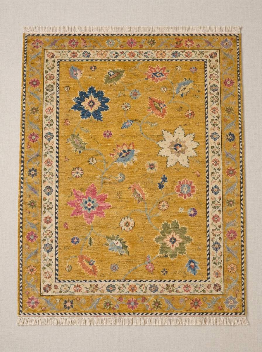 Oushak Hand Knotted Rug in mustard yellow wool with scattered multicolour floral motifs, ivory rosette border and fringe