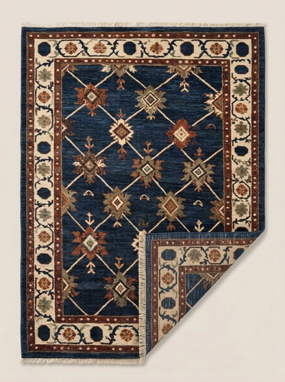 Oushak Hand Knotted Rug in deep navy wool, with an ivory diagonal lattice, rust and sage stars, and floral border.