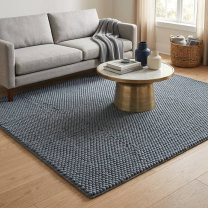 Chunky Wool Rug in slate blue-gray, with a thick handwoven surface of tightly spaced rounded pebble loops.