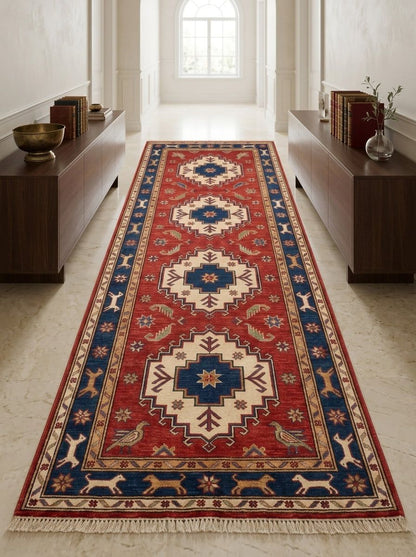 Hand Knotted Oushak Runner Rug in red wool with ivory and navy stepped medallions, birds, animal border and fringe.