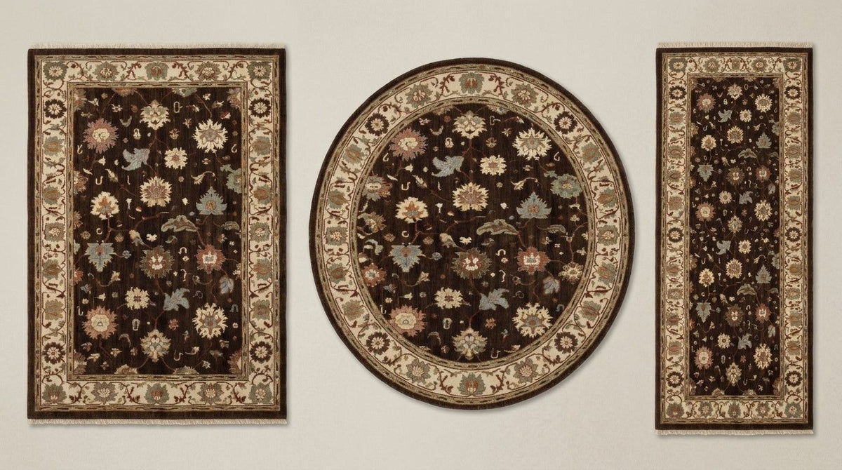 Oushak Hand Knotted Rug in chocolate brown wool, with multicoloured floral motifs and an ivory palmette border.
