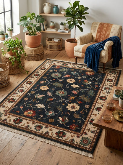 Oushak Hand Knotted Rug in deep navy wool, with scattered multicolour florals and an ivory palmette border.