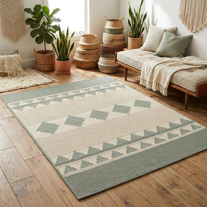 Southwestern Flatweave Wool Rug in sage green and cream, with ribbed texture and geometric diamond and triangle bands.