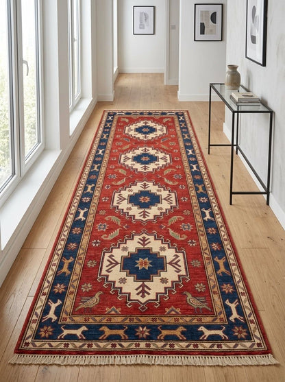 Hand Knotted Oushak Runner Rug in red wool, with ivory and navy geometric medallions, animal motifs and fringed ends.