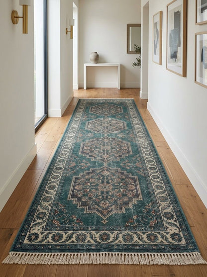 Hand Knotted Oushak Runner Rug in distressed teal wool, with ivory floral medallions, ornate border, and fringe.