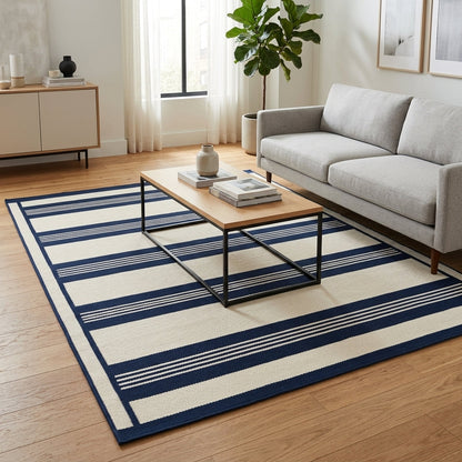 Flatweave wool rug in navy and ivory stripes, Southwestern Flatweave Wool Rug with bold bands, fine pinstripes, and a framed edge.