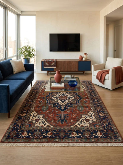 Heriz Hand Knotted Wool Rug in rust red and navy, with a stepped medallion, ivory corner motifs and fringe.