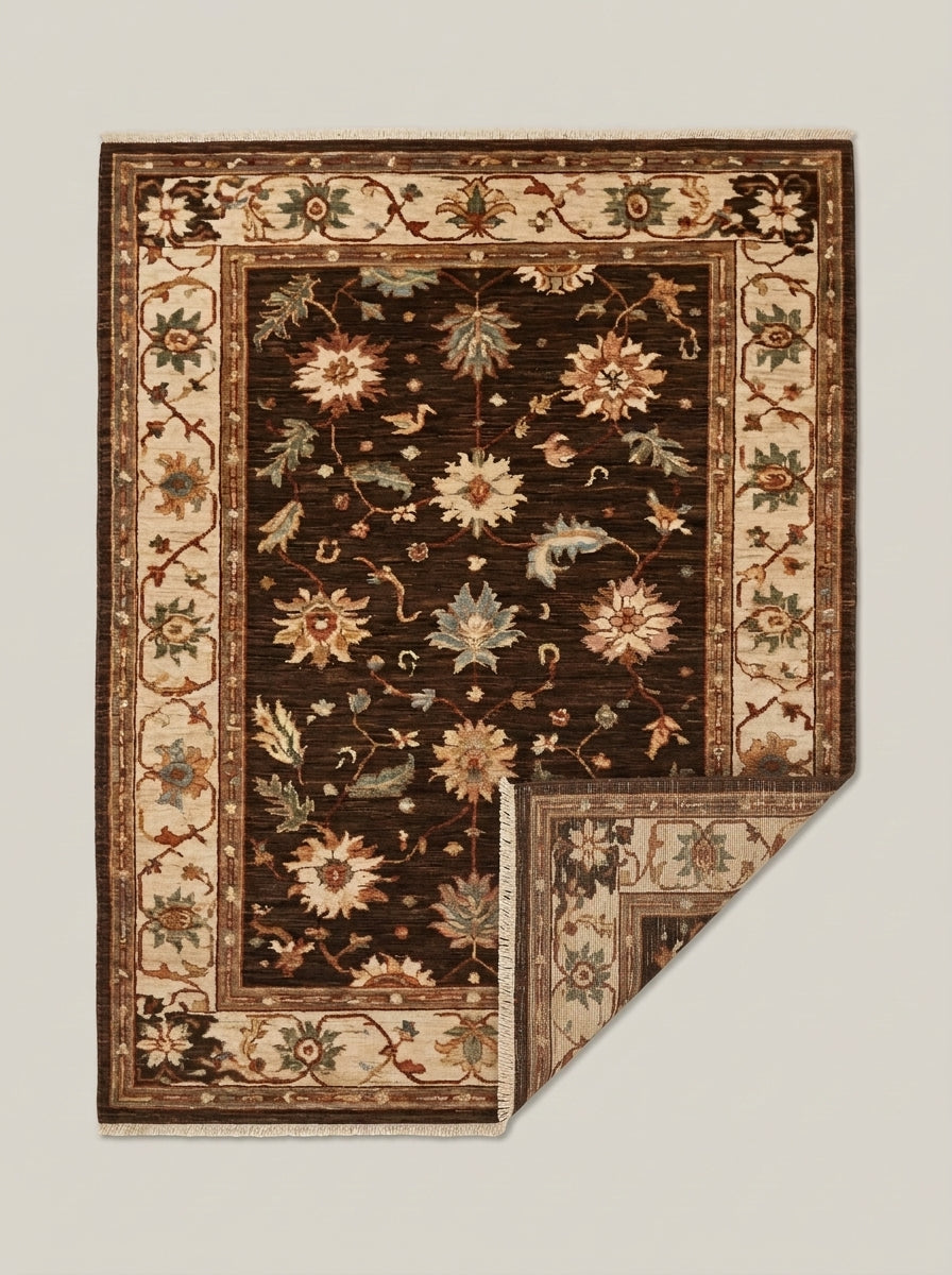 Oushak Hand Knotted Rug in espresso brown wool, with floral motifs in rust, cream, gold and sage and a beige scrolling border.