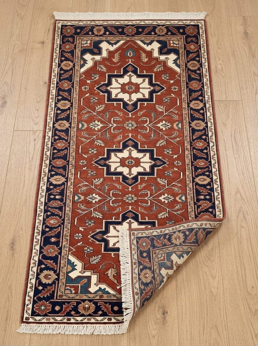 Hand Knotted Oushak Runner Rug in rust red wool, with ivory and navy geometric medallions, floral motifs and fringe.