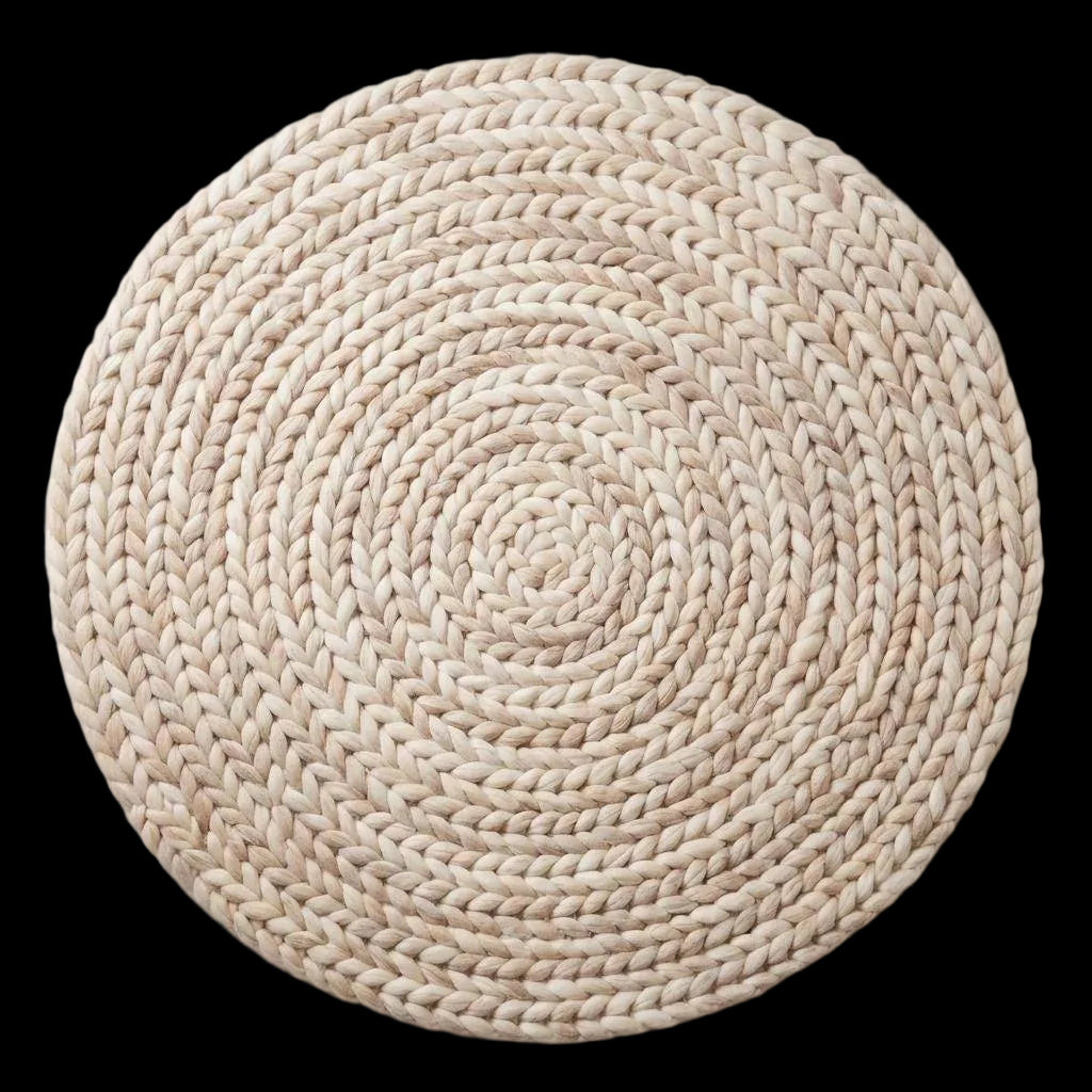 Round chunky knit wool rug in cream, handwoven Scandinavian style for cozy nursery and modern home decor