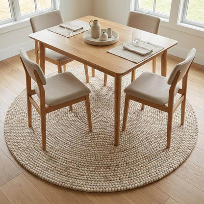 Round chunky knit wool rug in cream, handwoven Scandinavian nursery decor with cozy texture