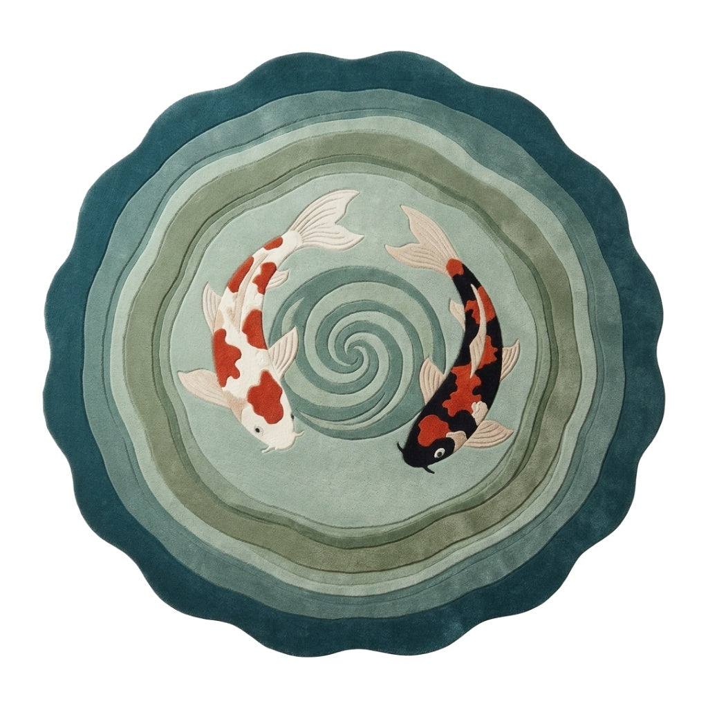 Round Koi Fish Rug in teal, sage and pale aqua wool, with two white, orange and black koi circling a spiral.