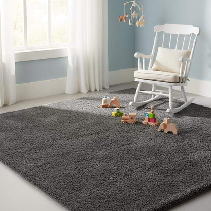 Soft dense pile grey rug for contemporary home styling, photographed with armchair on concrete floor. __etsy:7500525020