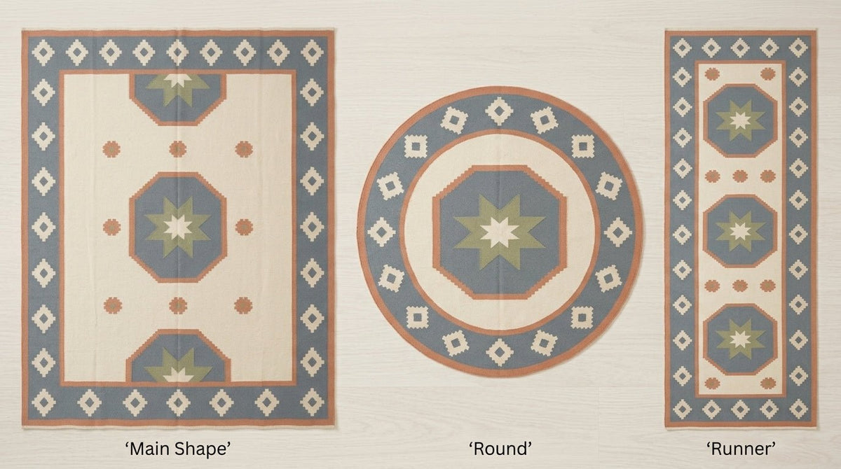 Southwestern Flatweave Wool Rug in ivory, dusty blue, peach and sage, with star medallions and stepped diamond border.