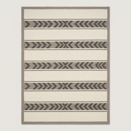 Southwestern Flatweave Wool Rug with ivory bands, taupe borders and charcoal chevron stripes in a flatwoven design.