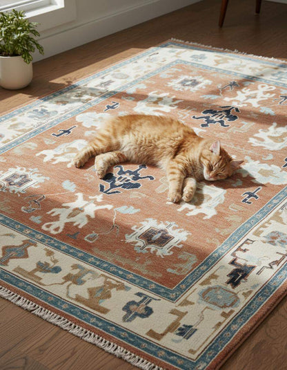 Hand-tufted terracotta Oushak rug with geometric patterns and wool texture for Southwestern boho decor