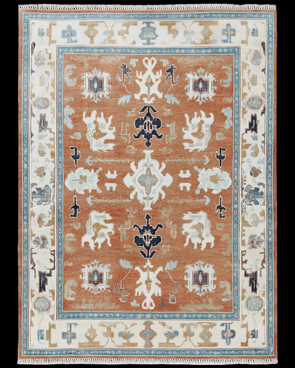Hand-tufted terracotta Oushak rug with Southwestern geometric patterns and wool texture