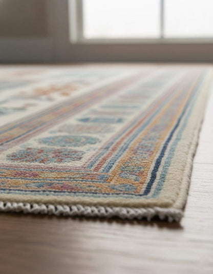 Terracotta Oushak wool rug with geometric Southwestern tribal design and earthy color palette