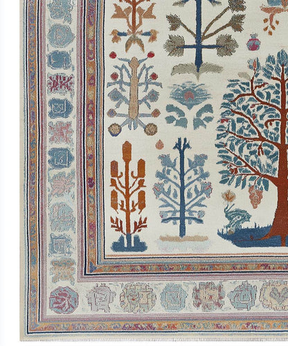 Hand-tufted terracotta Oushak wool rug with geometric Southwestern medallion patterns and rich earthy tones