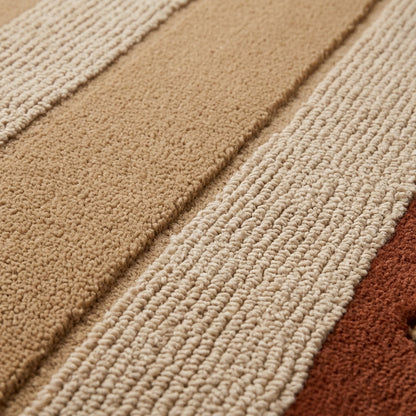 Terracotta & Sand Striped wool rug with plush hand-tufted sand and cream bands and a terracotta border.