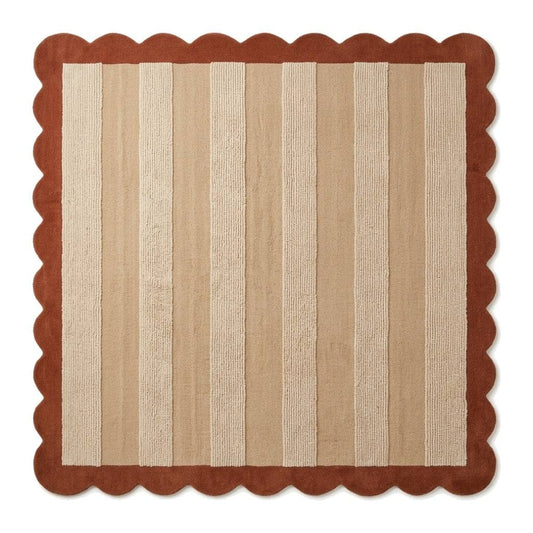 Terracotta & Sand Striped wool rug with alternating cream and beige bands, framed by a rust terracotta scalloped border.