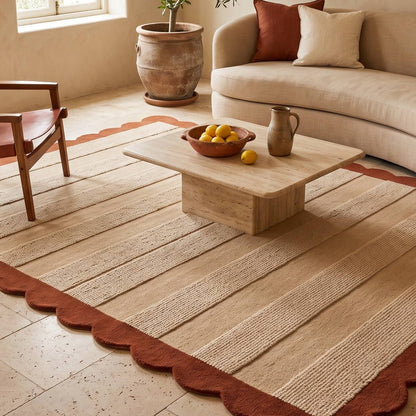 Terracotta & Sand Striped wool rug with textured beige bands and a rust terracotta border, finished with scalloped edges.