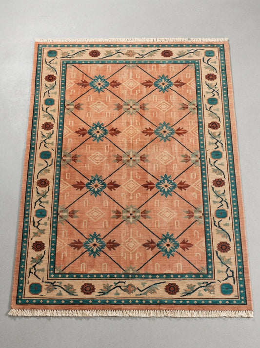 Terracotta Teal Trellis Hand Knotted Wool Area Rug in terracotta wool, with teal and rust star medallions, a diagonal trellis, and an ivory floral border.