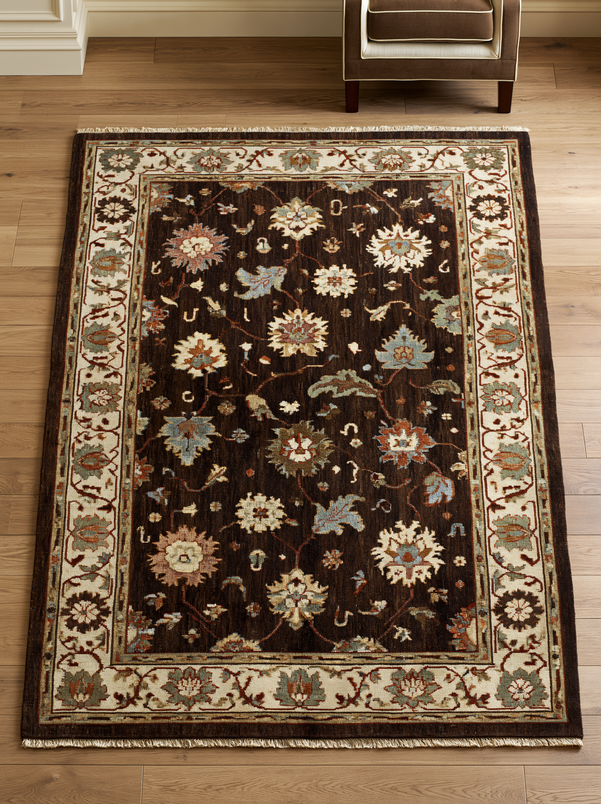Oushak Hand Knotted Rug in chocolate brown wool, with multicoloured floral motifs and a wide ivory palmette border.