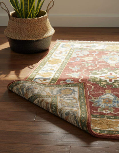 Vintage Oushak wool rug with muted rust, cream, and sage medallion design, hand-knotted 8x10 area carpet