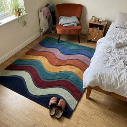 Wave Stripe Rug in multicolour wool with flowing teal, navy, rust, mustard, burgundy and mauve bands