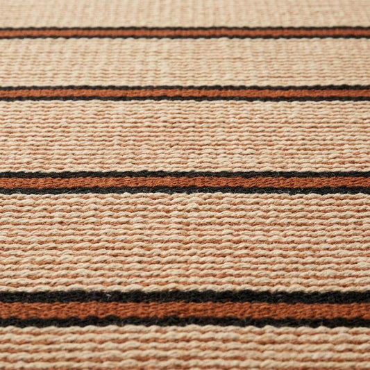 Handwoven wool flatweave runner rug with ivory, navy, and rust stripes for kitchen and hallway use